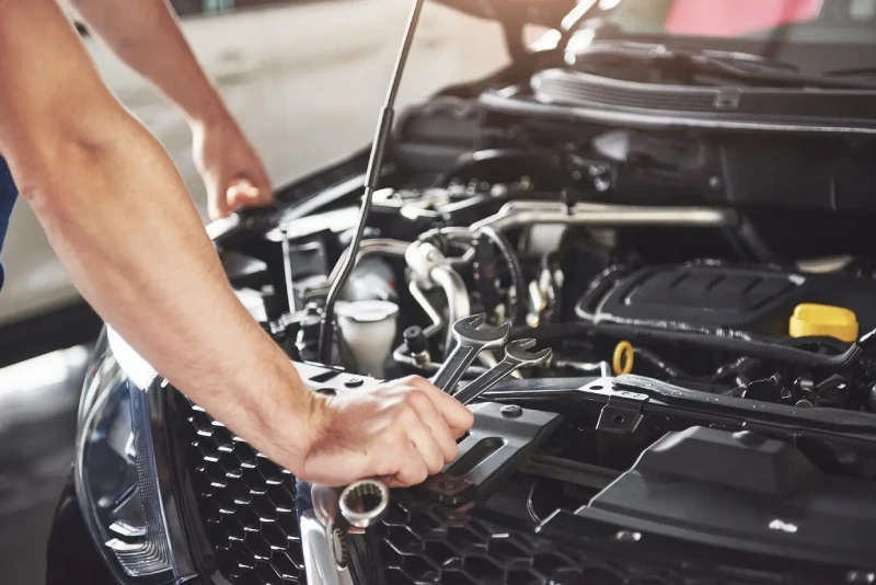 close-up-hands-unrecognizable-mechanic-doing-car-service-maintenance_146671-19689